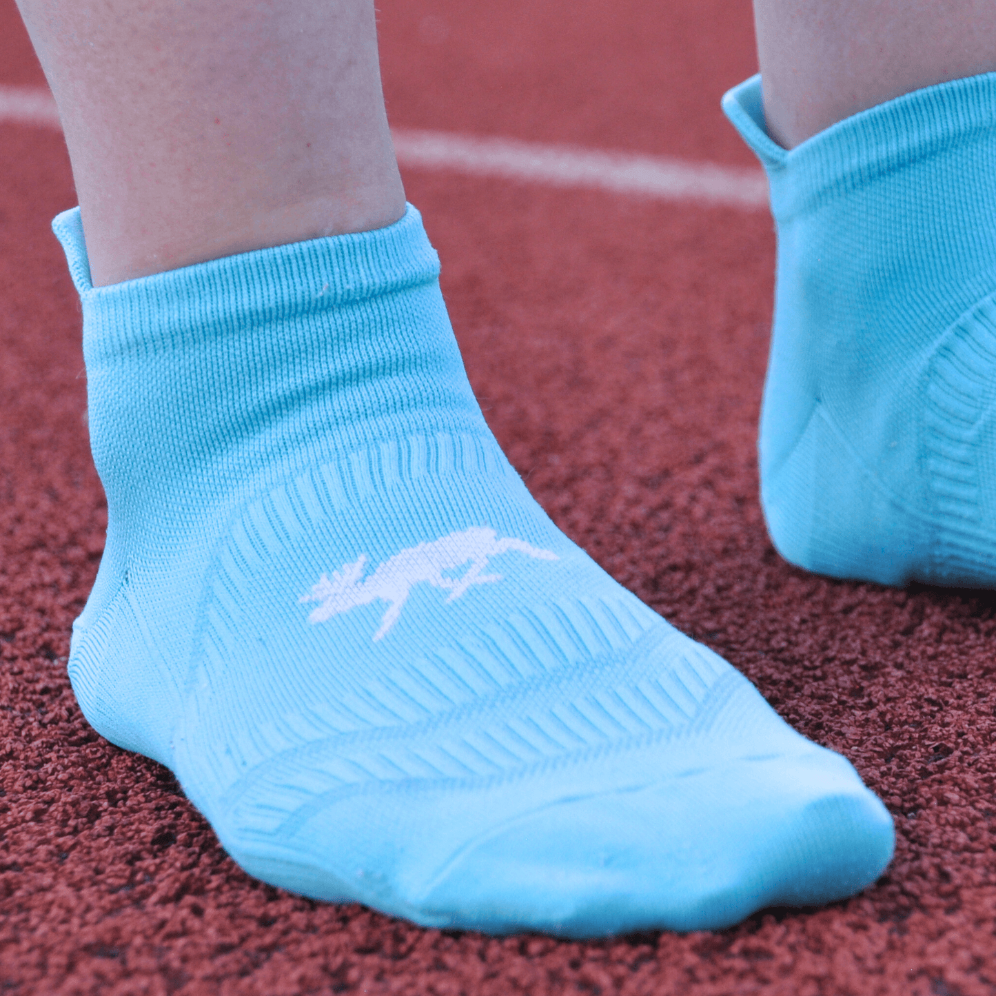 SockMoose SpeedyMoose Ankle Tab 2.0 mint close up image on track