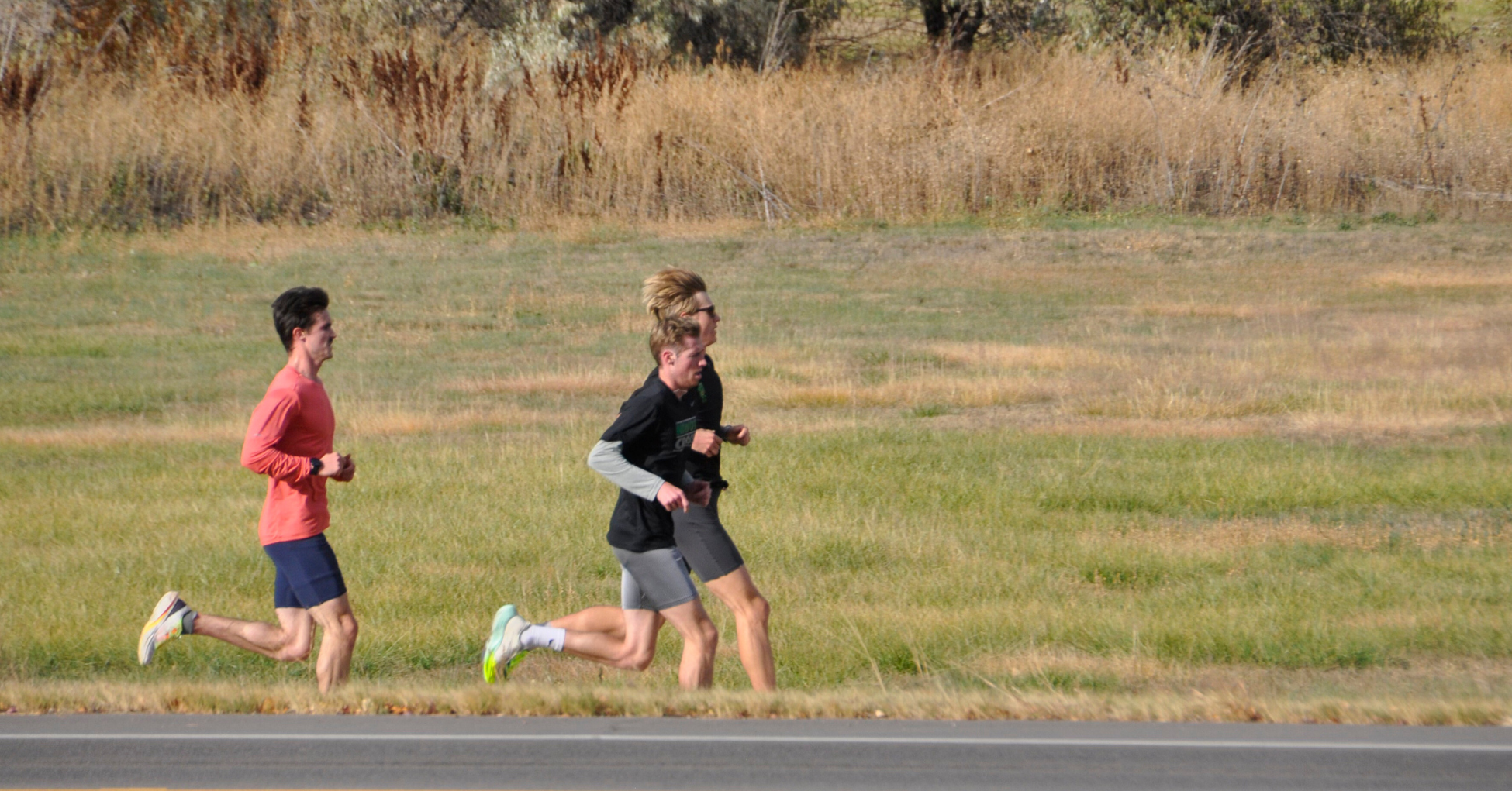 Group of male runners running in SockMoose running socks in Boulder, CO